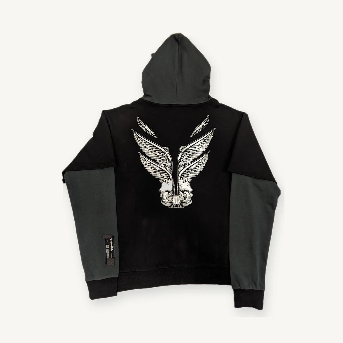 Back view of layered hoodie with large monochrome wing graphic