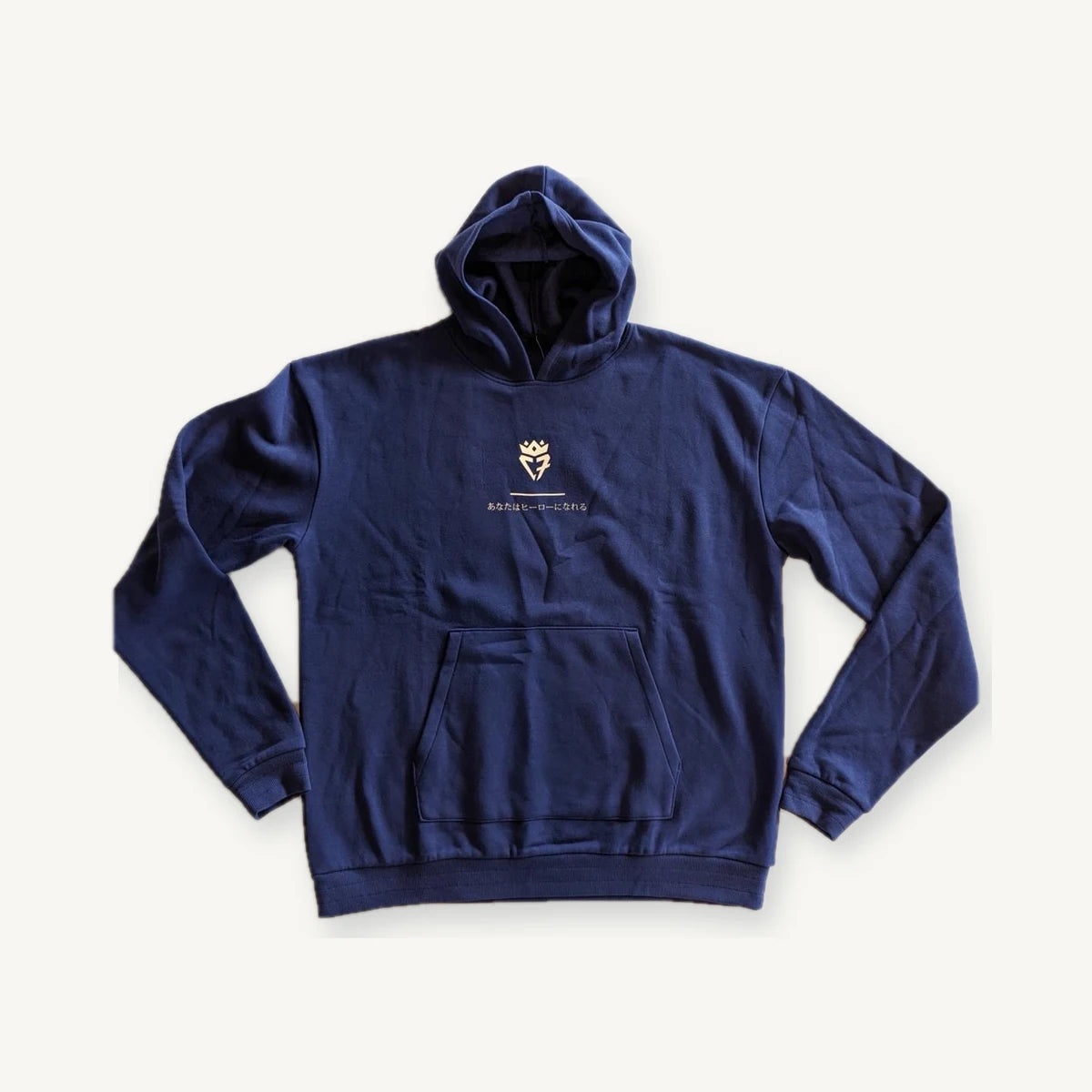 Navy pullover hoodie with small centered chest graphic