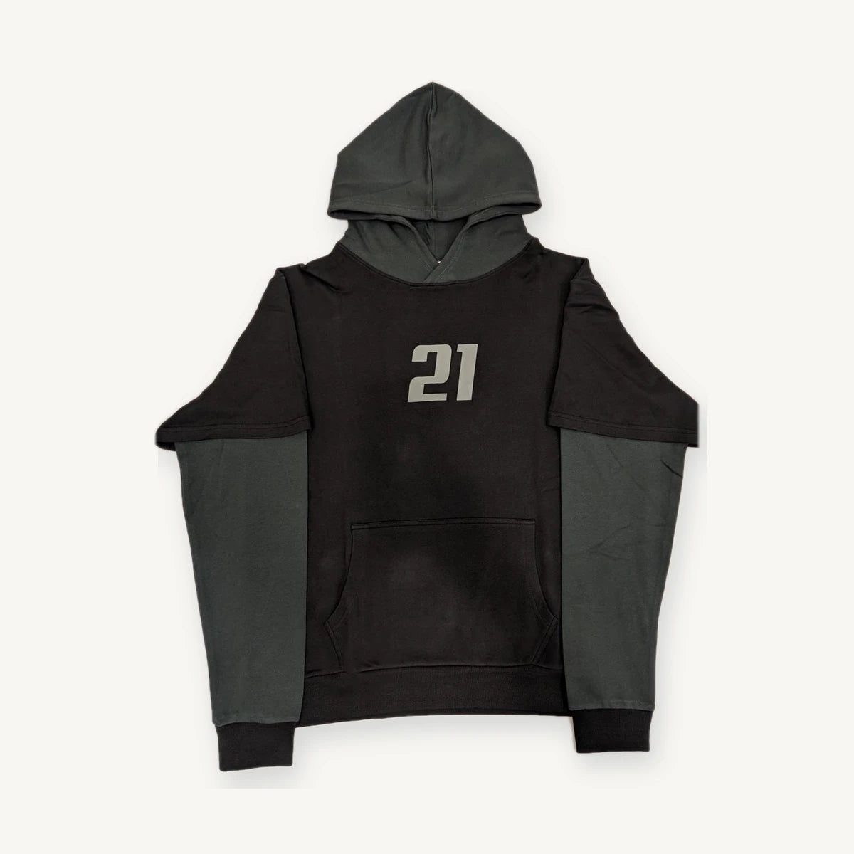 Layered two-tone hoodie construction produced through our manufacturing network